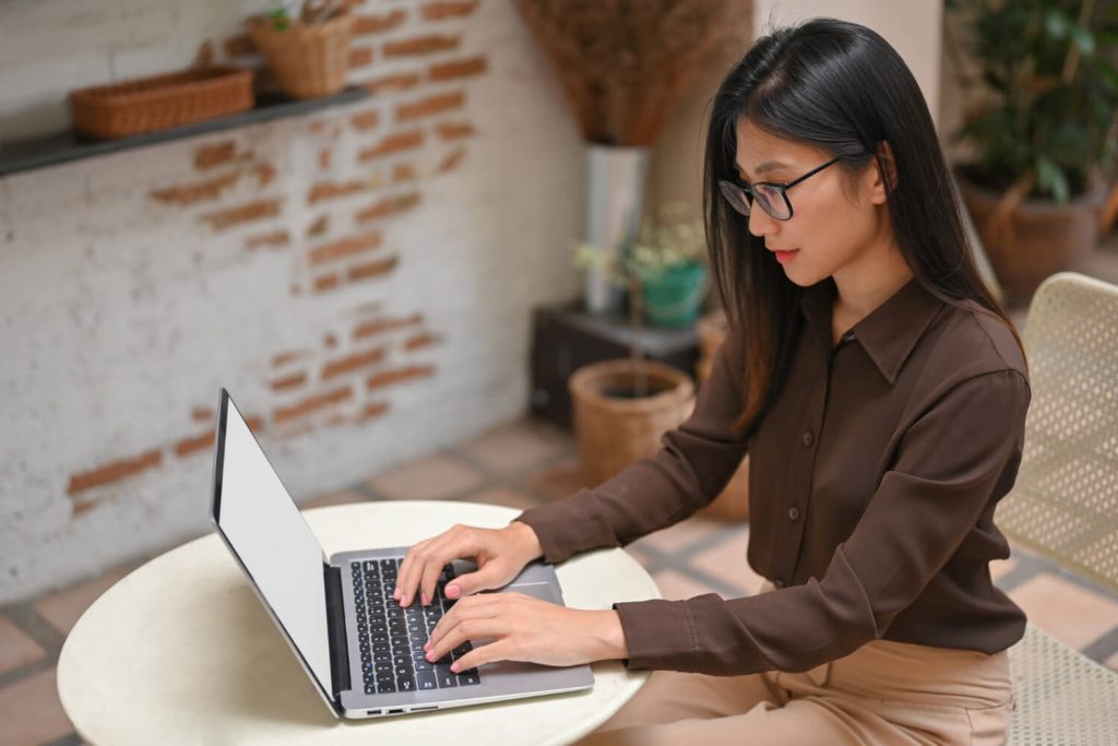 female freelancer working with laptop
